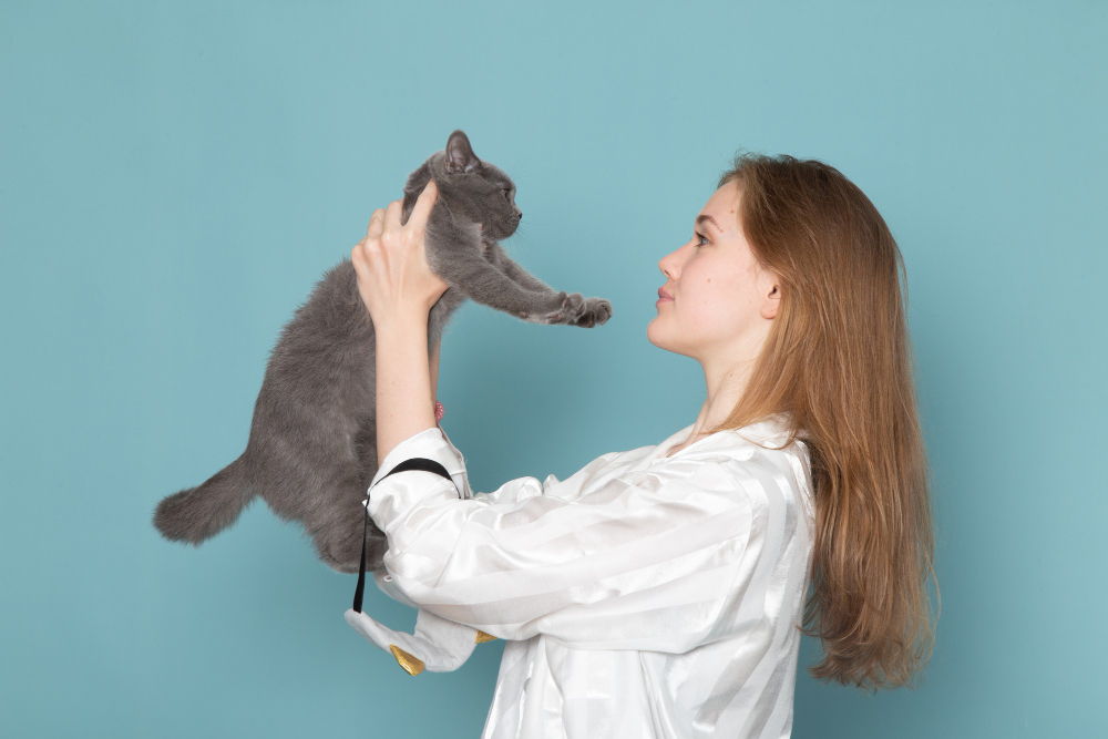 Woman holding a cat